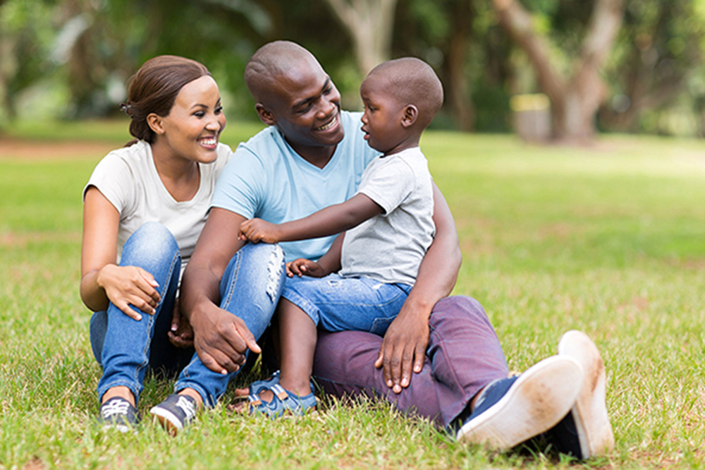 family of 3 at the park